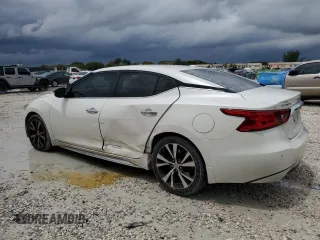 2017 Nissan Maxima SV with VIN 1N4AA6APXHC446995, listed as a Copart auction lot 51633115 with 56,949 mi miles and Salvage Title. Bid and sale history available at DreamBid. Image 2.