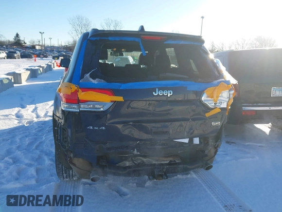 2014 Jeep Grand Cherokee Overland with VIN 1C4RJFCG1EC200570, listed as a IAAI auction lot 41301398 with 183,986 mi miles. Bid and sale history available at carsss.com. Image 6.
