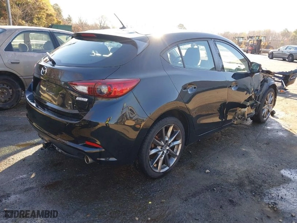 2018 Mazda Mazda3 5-Door Touring with VIN 3MZBN1L31JM200628, listed as a IAAI auction lot 41680209 with 95,656 mi miles. Bid and sale history available at carsss.com. Image 4.