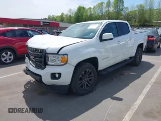 2019 GMC Canyon 4WD SLE z VIN 1GTG6CENXK1319647, wystawiony jako IAAI lot #42039568 z przebiegiem 56 371 mil mil oraz . Historia ofert i sprzedaży dostępna na DreamBid. Obrazek 2.