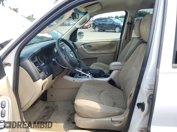 2006 Mazda Tribute S with VIN 4F2YZ04136KM18674, listed as a Copart auction lot 65126554 with 186,941 mi miles and Clean Title. Bid and sale history available at DreamBid. Image 7.