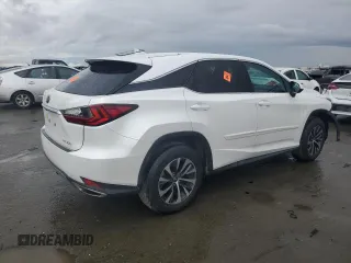 2022 Lexus RX 350 with VIN 2T2AZMDA5NC336823, listed as a Copart auction lot 86950954 with 38,959 mi miles and Salvage title. Bid and sale history available at DreamBid. Image 3.