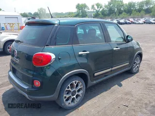 2014 FIAT 500L Trekking z VIN ZFBCFADH8EZ018575, wystawiony jako IAAI lot #42415012 z przebiegiem 100 301 mil mil oraz . Historia ofert i sprzedaży dostępna na DreamBid. Obrazek 4.