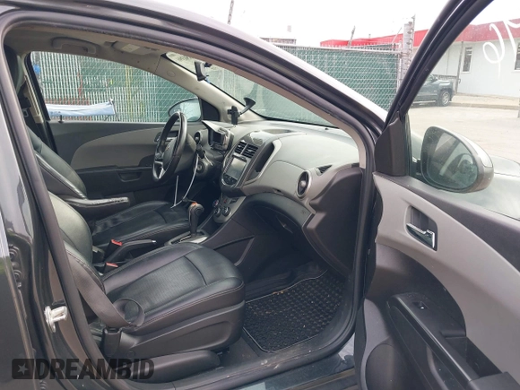 2014 Chevrolet Sonic LTZ with VIN 1G1JE5SB1E4200234, listed as a IAAI auction lot 41850396 with 173,324 mi miles. Bid and sale history available at carsss.com. Image 5.