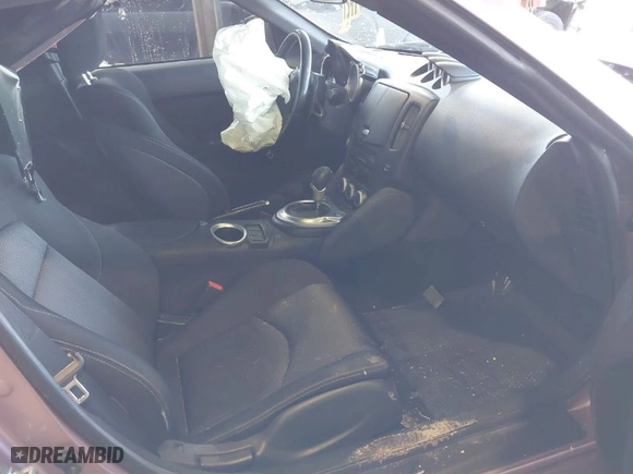 2014 Nissan 370Z with VIN JN1AZ4EH7EM631492, listed as a IAAI auction lot 41871006 with 68,354 mi miles. Bid and sale history available at carsss.com. Image 5.