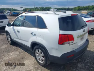 2013 Kia Sorento LX with VIN 5XYKT3A69DG348383, listed as a IAAI auction lot 42195952 with 179,451 mi miles and . Bid and sale history available at carsss.com. Image 3.