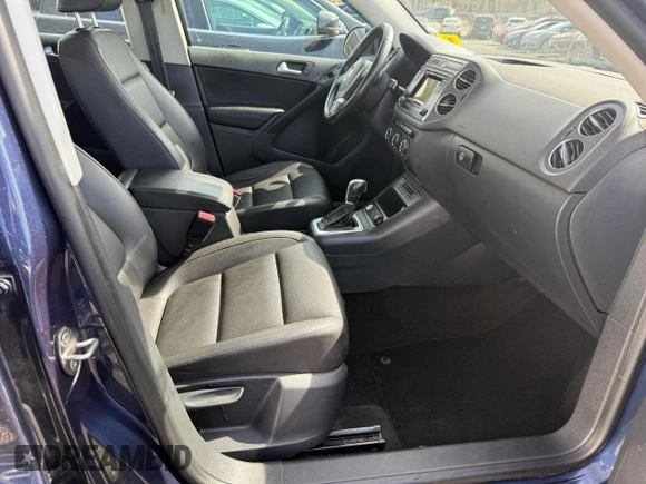 2016 Volkswagen Tiguan S with VIN WVGBV7AX1GW001756, listed as a Copart auction lot 53538165 with 105,641 mi miles and Clean Title. Bid and sale history available at DreamBid. Image 5.