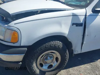 2002 Ford F-150 XL with VIN 1FTRF172X2NC07830, listed as a IAAI auction lot 41584706 with 143,255 mi miles. Bid and sale history available at carsss.com. Image 13.
