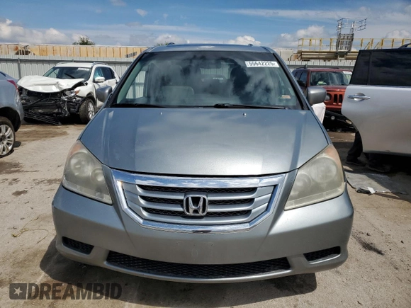 2010 Honda Odyssey EX-L с VIN 5FNRL3H79AB073307, выставлен на аукционе Copart как лот 55642225 с пробегом Не указан миль и Списание • Salvage title. История ставок и продаж доступна на DreamBid. Изображение 5.