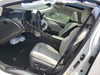 2024 Lexus RX with VIN 2T2BAMCAXRC071481, listed as a Copart auction lot 59457934 with 9,874 mi miles and Salvage Title. Bid and sale history available at carsss.com. Image 7.