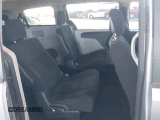 2016 Dodge Grand Caravan SXT with VIN 2C4RDGCG9GR323668, listed as a IAAI auction lot 42025601 with 125,351 mi miles and . Bid and sale history available at DreamBid. Image 8.
