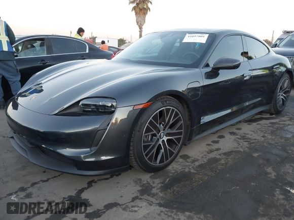 2021 Porsche Taycan with VIN WP0AA2Y15MSA18727, listed as a IAAI auction lot 41097801 with 20,933 mi miles and . Bid and sale history available at DreamBid. Image 2.