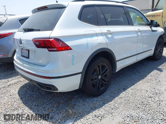 2022 Volkswagen Tiguan SE R-Line Black z VIN 3VVCB7AX1NM078210, wystawiony jako IAAI lot #42374836 z przebiegiem 37 774 mil mil oraz . Historia ofert i sprzedaży dostępna na DreamBid. Obrazek 4.