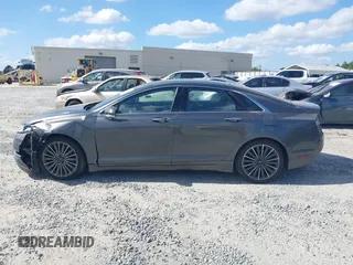2016 Lincoln MKZ with VIN 3LN6L2GK5GR601446, listed as a IAAI auction lot 40631505 with 118,602 mi miles and . Bid and sale history available at DreamBid. Image 14.