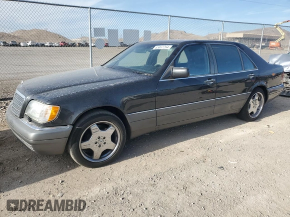 1995 Mercedes-Benz S with VIN WDBGA43E9SA233994, listed as a Copart auction lot 65867264 with 655,674 mi miles and Salvage Title. Bid and sale history available at DreamBid. Image 1.