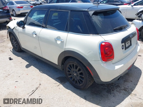 2016 MINI Hardtop 4 Door z VIN WMWXU1C50G2D08848, wystawiony jako IAAI lot #42215256 z przebiegiem 102 643 mil mil oraz . Historia ofert i sprzedaży dostępna na DreamBid. Obrazek 3.