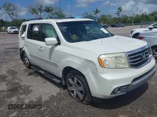 2012 Honda Pilot Touring with VIN 5FNYF3H9XCB035494, listed as a IAAI auction lot 42011362 with 271,887 mi miles and . Bid and sale history available at carsss.com. Image 6.