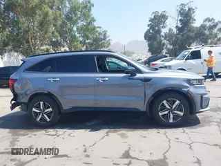 2021 Kia Sorento S with VIN 5XYRL4LCXMG073937, listed as a IAAI auction lot 42595810 with 71,507 mi miles and . Bid and sale history available at DreamBid. Image 14.