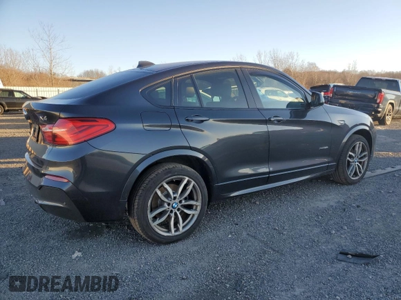2016 BMW X4 xDrive28i z VIN 5UXXW3C58G0M90492, wystawiony jako Copart lot #87219454 z przebiegiem 129 335 mil mil oraz Szkoda całkowita • Salvage title. Historia ofert i sprzedaży dostępna na DreamBid. Obrazek 3.