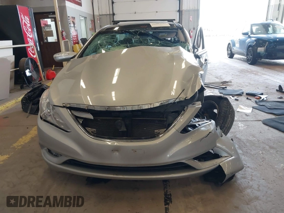 2012 Hyundai Sonata Limited z VIN 5NPEC4AC6CH361933, wystawiony jako IAAI lot #42004586 z przebiegiem 88 500 mil mil oraz . Historia ofert i sprzedaży dostępna na DreamBid. Obrazek 12.