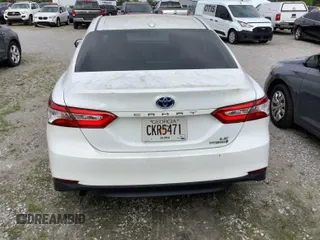 2019 Toyota Camry Hybrid LE z VIN 4T1B31HK8KU513998, wystawiony jako IAAI lot #42165147 z przebiegiem 59 641 mil mil oraz . Historia ofert i sprzedaży dostępna na DreamBid. Obrazek 1.