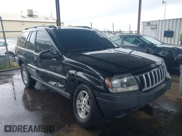 2004 Jeep Grand Cherokee Laredo z VIN 1J4GX48N94C435700, wystawiony jako IAAI lot #41809624 z przebiegiem 147 413 mil mil oraz . Historia ofert i sprzedaży dostępna na DreamBid. Obrazek 1.