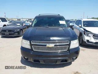 2011 Chevrolet Suburban LT with VIN 1GNSCJE09BR235355, listed as a IAAI auction lot 42030105 with 308,576 mi miles. Bid and sale history available at carsss.com. Image 6.