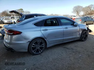 2019 Ford Fusion Titanium with VIN 3FA6P0D92KR141420, listed as a Copart auction lot 88300925 with 138,136 mi miles and Salvage Title. Bid and sale history available at carsss.com. Image 3.