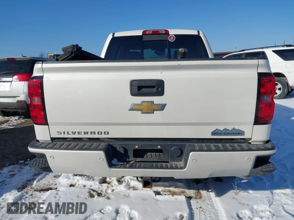 2014 Chevrolet Silverado 1500 High Country with VIN 3GCUKTEC1EG529203, listed as a IAAI auction lot 41643824 with 153,176 mi miles and . Bid and sale history available at DreamBid. Image 17.