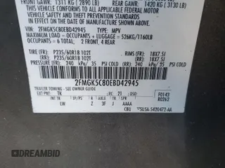 2014 Ford Flex SEL z VIN 2FMGK5C80EBD42945, wystawiony jako Copart lot #45456055 z przebiegiem 181 896 mil mil oraz Szkody całkowita. Historia ofert i sprzedaży dostępna na DreamBid. Obrazek 16.