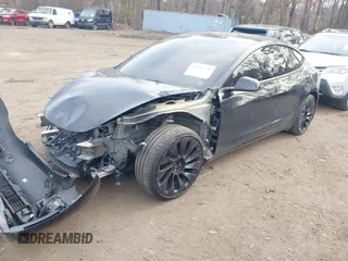 2023 Tesla Model 3 Long Range with VIN 5YJ3E1EB6PF673532, listed as a IAAI auction lot 41885716 with 39,690 mi miles and . Bid and sale history available at DreamBid. Image 20.