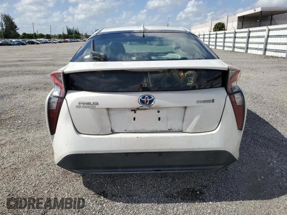2017 Toyota Prius Two z VIN JTDKARFU6H3030019, wystawiony jako Copart lot #54850235 z przebiegiem 200 292 mil mil oraz Czysty tytuł • Clean title. Historia ofert i sprzedaży dostępna na DreamBid. Obrazek 6.