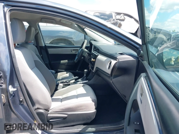 2018 Toyota Corolla L with VIN 5YFBURHE1JP832911, listed as a IAAI auction lot 42237901 with 92,158 mi miles and . Bid and sale history available at DreamBid. Image 5.