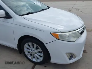 2014 Toyota Camry SE with VIN 4T1BK1FK5EU551196, listed as a IAAI auction lot 41912297 with 104,445 mi miles. Bid and sale history available at carsss.com. Image 17.