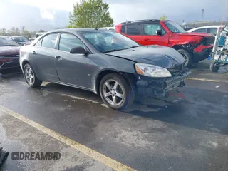 2008 Pontiac G6 with VIN 1G2ZG57N484123391, listed as a IAAI auction lot 42053871 with 214,766 mi miles. Bid and sale history available at carsss.com. Image 1.