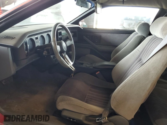 1986 Pontiac Firebird with VIN 1G2FX87S7GL202276, listed as a Copart auction lot 46745175 with 32,777 mi miles and Clean title. Bid and sale history available at DreamBid. Image 7.