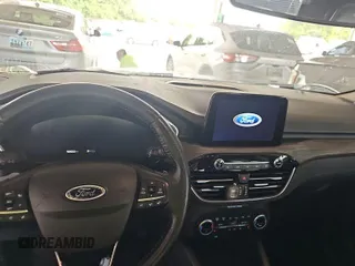 2020 Ford Escape Titanium Hybrid z VIN 1FMCU0DZ2LUB82013, wystawiony jako IAAI lot #42727391 z przebiegiem 92 623 mil mil oraz . Historia ofert i sprzedaży dostępna na DreamBid. Obrazek 9.