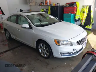 2016 Volvo S60 T5 Drive-E Premier with VIN YV126MFKXG2410966, listed as a IAAI auction lot 41308772 with 262,816 mi miles. Bid and sale history available at carsss.com. Image 1.