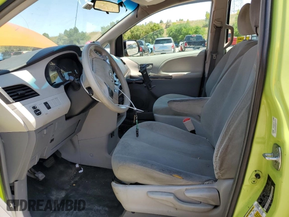 2014 Toyota Sienna L with VIN 5TDZK3DC1ES415890, listed as a Copart auction lot 62812484 with 270,286 mi miles and Salvage Title. Bid and sale history available at carsss.com. Image 7.