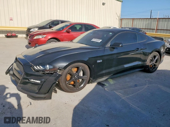2021 Ford Mustang GT with VIN 1FA6P8CFXM5132329, listed as a Copart auction lot 52425335 with 49,262 mi miles and Salvage title. Bid and sale history available at DreamBid. Image 1.
