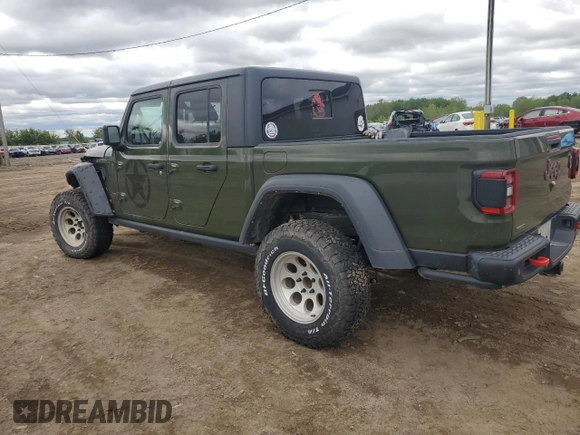 2021 Jeep Gladiator Rubicon with VIN 1C6JJTBM6ML580028, listed as a Copart auction lot 56526085 with 55,462 mi miles and Salvage title. Bid and sale history available at DreamBid. Image 2.