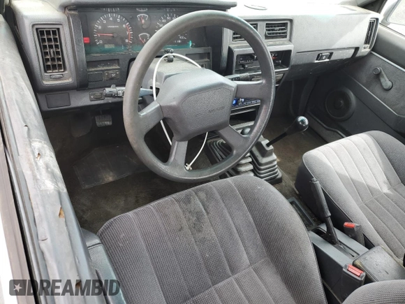 1993 Nissan Frontier SE z VIN 1N6HD16Y0PC408188, wystawiony jako Copart lot #71028394 z przebiegiem 258 939 mil mil oraz Szkoda całkowita • Salvage title. Historia ofert i sprzedaży dostępna na DreamBid. Obrazek 8.
