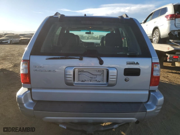 2003 Isuzu Rodeo with VIN 4S2DM58W734305363, listed as a Copart auction lot 85539774 with 219,300 mi miles and Salvage Title. Bid and sale history available at carsss.com. Image 6.