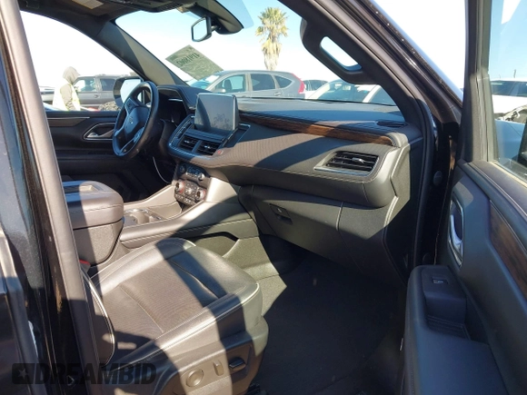 2022 Chevrolet Suburban Premier with VIN 1GNSCFKD9NR159466, listed as a IAAI auction lot 41918002 with 88,005 mi miles and . Bid and sale history available at DreamBid. Image 5.