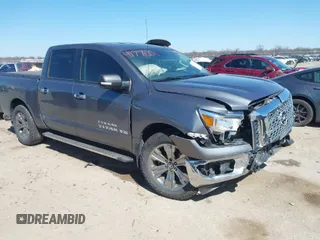 2018 Nissan Titan SV with VIN 1N6AA1E55JN513872, listed as a IAAI auction lot 41771001 with 57,920 mi miles and . Bid and sale history available at DreamBid. Image 1.
