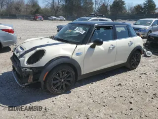 2017 MINI Hardtop 4 Door Cooper S z VIN WMWXU3C52H2B64183, wystawiony jako Copart lot #50393135 z przebiegiem 143 014 mil mil oraz Szkody całkowita. Historia ofert i sprzedaży dostępna na DreamBid. Obrazek 1.