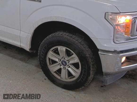 2019 Ford F-150 XL with VIN 1FTFX1E42KKC43579, listed as a IAAI auction lot 42548174 with 126,261 mi miles and . Bid and sale history available at DreamBid. Image 1.
