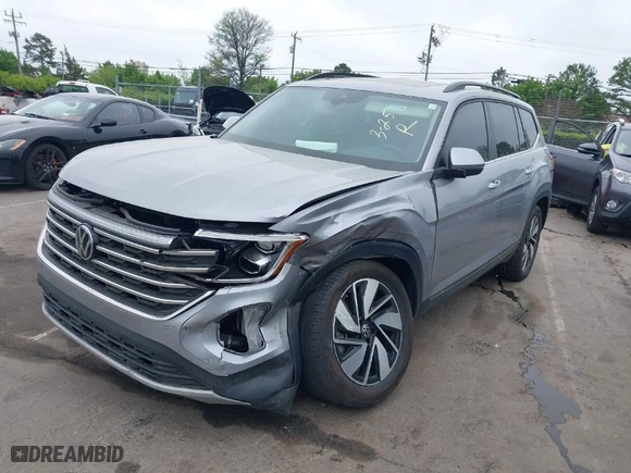 2024 Volkswagen Atlas 2.0T SE w/Technology with VIN 1V2JR2CA2RC563653, listed as a IAAI auction lot 41956579 with 35,356 mi miles. Bid and sale history available at carsss.com. Image 2.
