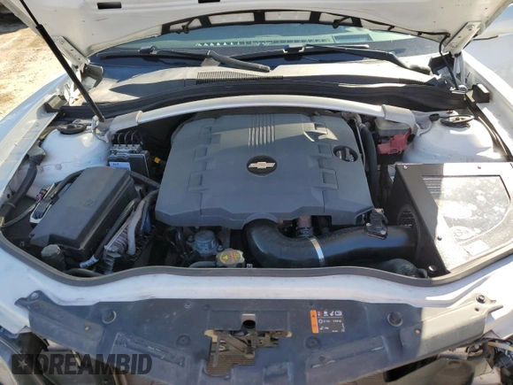 2013 Chevrolet Camaro LT z VIN 2G1FC3D30D9217897, wystawiony jako Copart lot #42090665 z przebiegiem 132 813 mil mil oraz Szkoda całkowita • Salvage title. Historia ofert i sprzedaży dostępna na DreamBid. Obrazek 13.