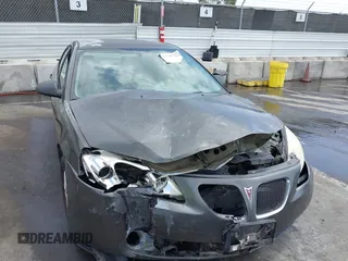 2006 Pontiac G6 6-Cyl with VIN 1G2ZG558164166807, listed as a IAAI auction lot 42107709 with 118,680 mi miles and . Bid and sale history available at DreamBid. Image 6.